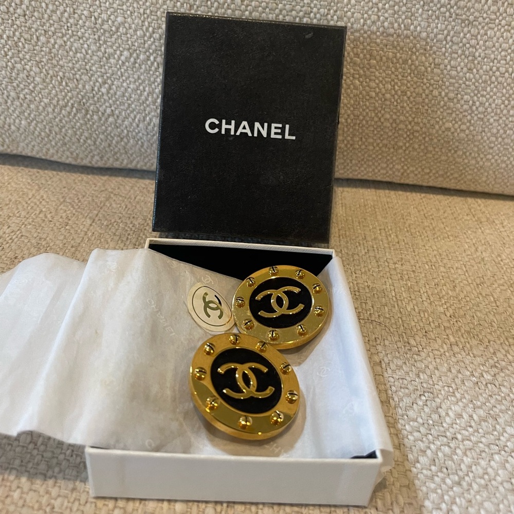 Authentic Chanel clip on earrings still in box.  Like brand new never worn.